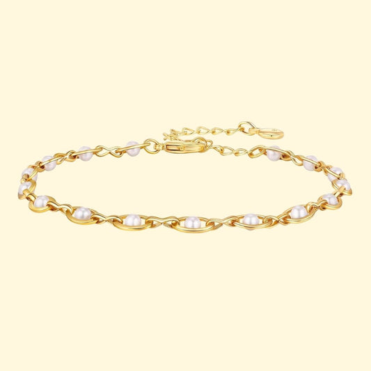 Perlen-Gliederarmband – Elegantes vergoldetes Armband mit zarten Kunstperlen